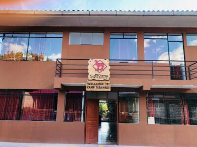 Large building with plaque named Camp Tarawasi.