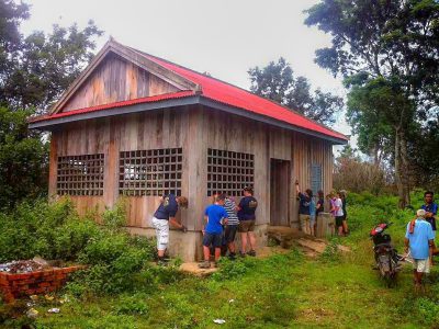 school_expedition_cambodia_trek_painting_building