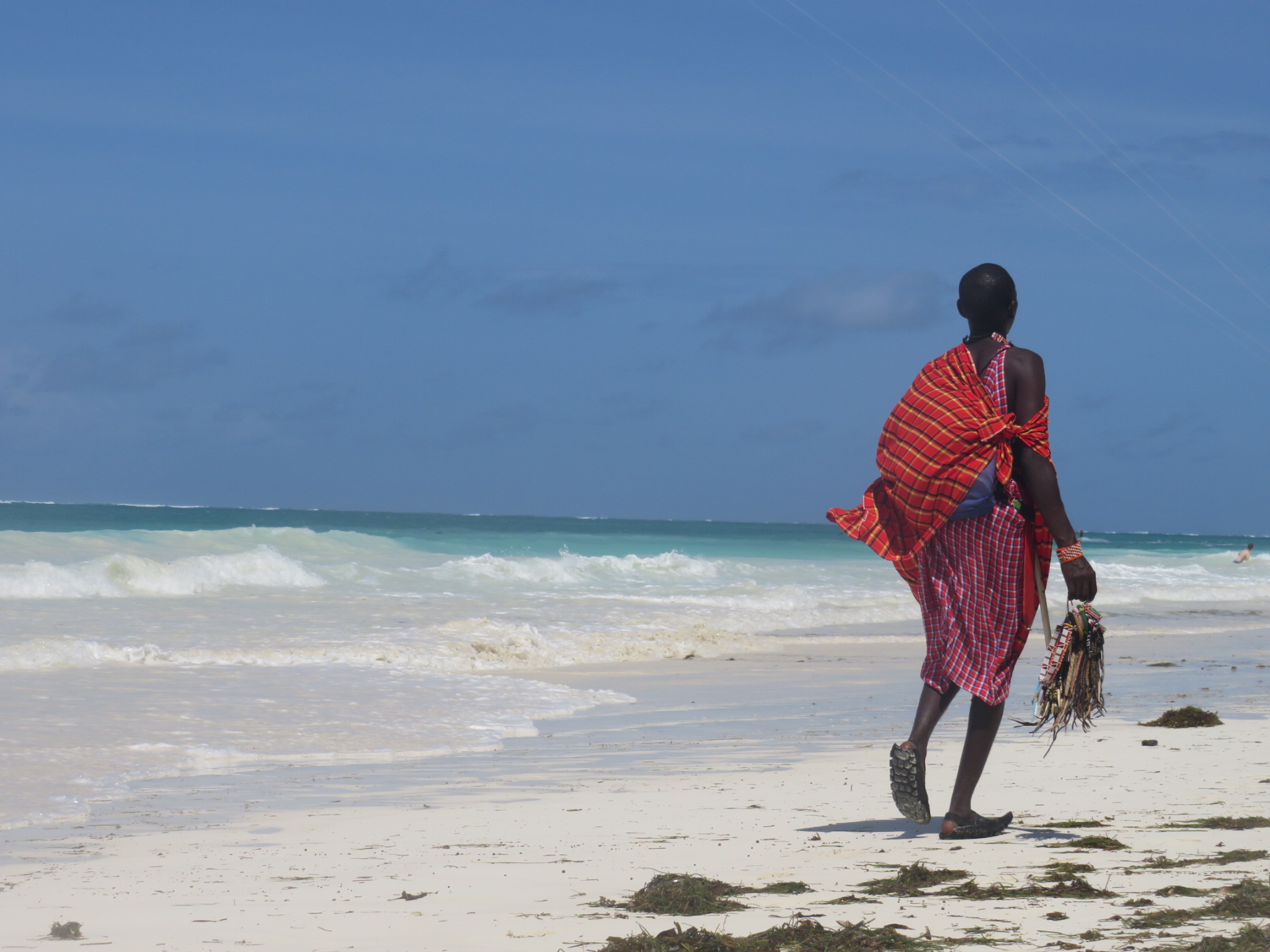 school_expedition_kenya_impact_maasai_on_beach