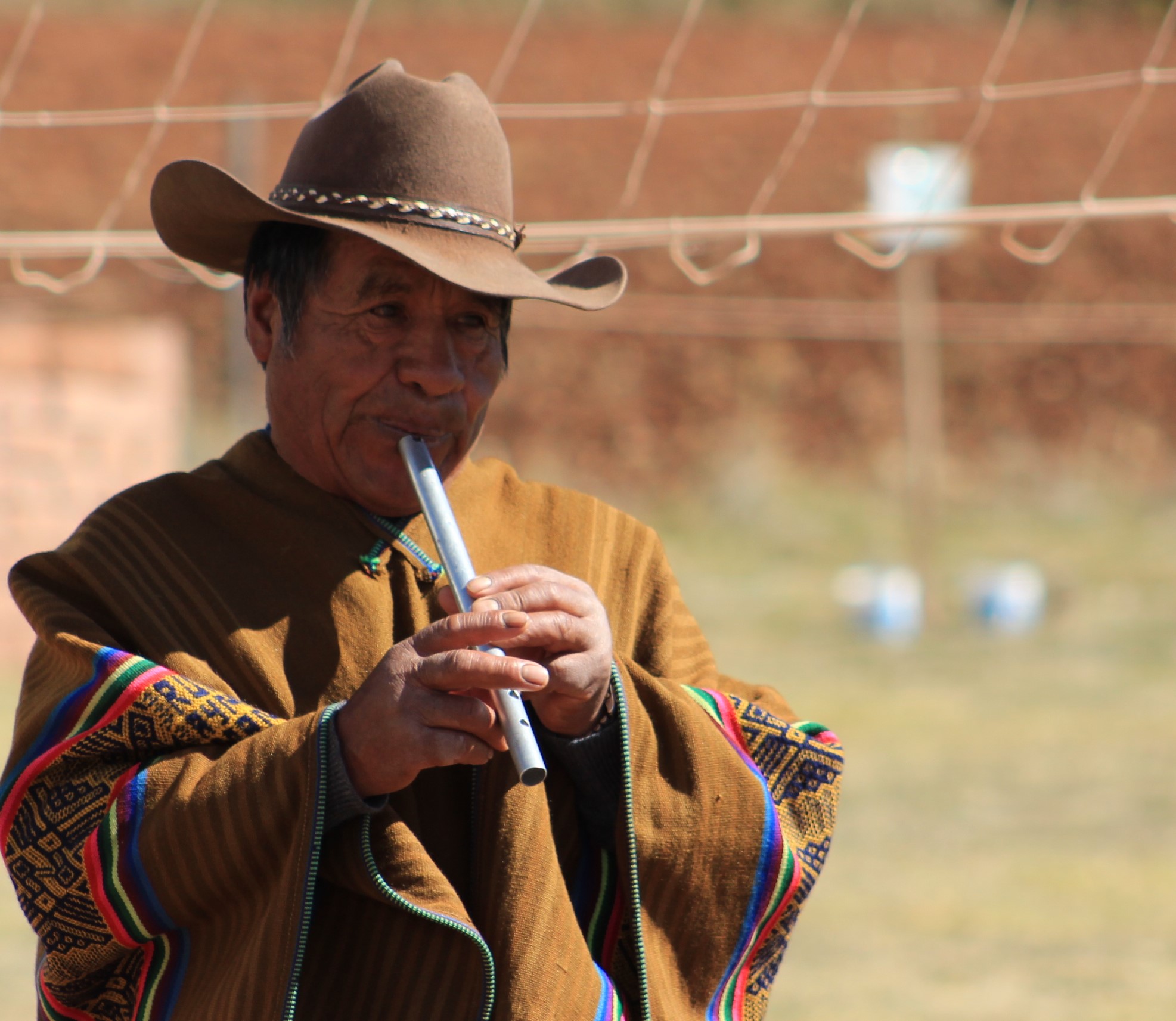 school_expedition_peru_trek_flute_player