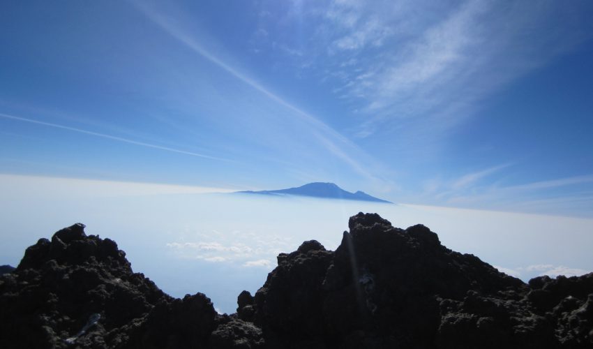 school_expedition_tanzania_trek_top_of_mountain