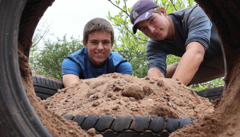 Two travellers on working on a project in South Africa