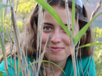 Girl in the grass - environmental project work in South Africa