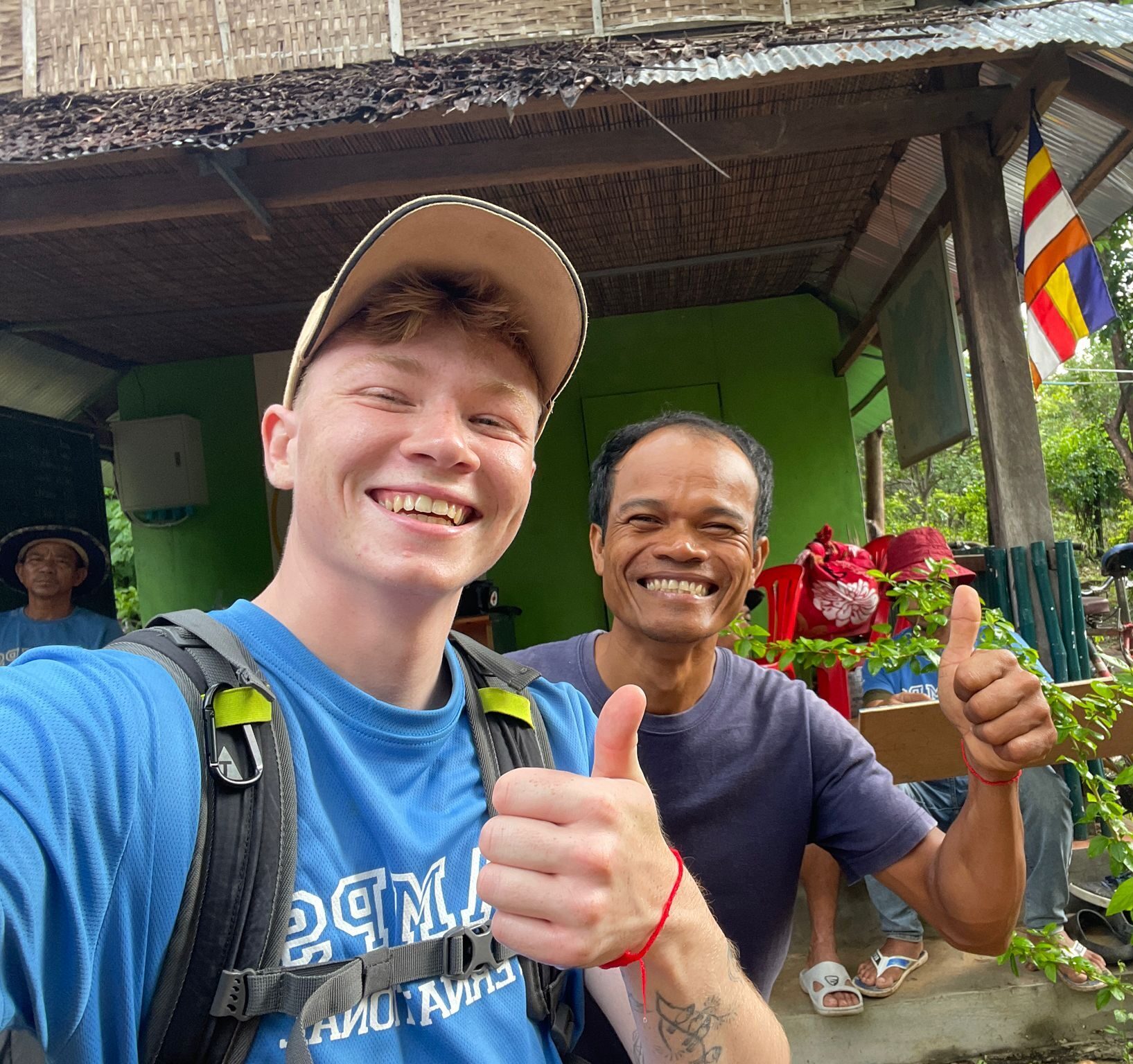Traveller and camp crew in Cambodia
