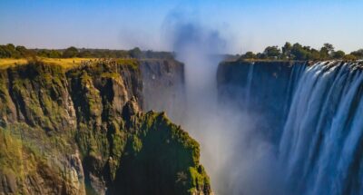 Travellers looking over Victoria waterfall.