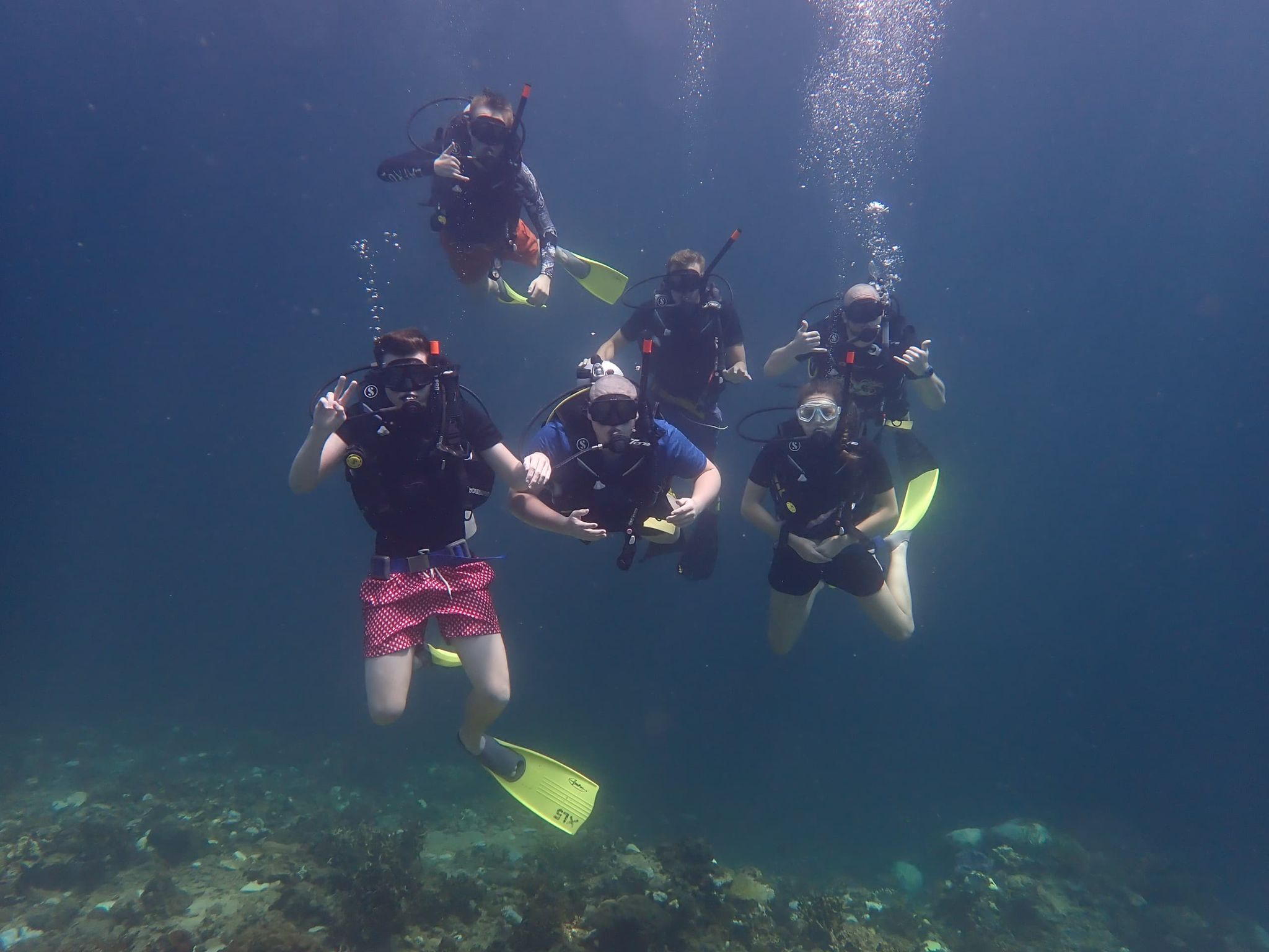 Travellers on scuba dive.