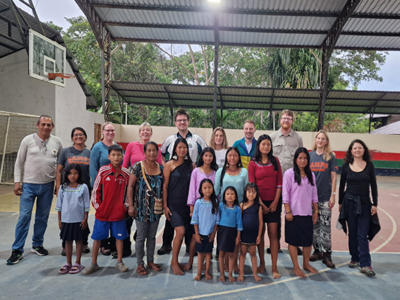 Shiwakucha Community Camp Ecuador greeting group on an Ecuador teacher inspection visit
